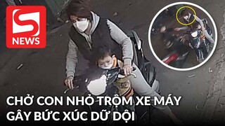 Người phụ nữ chở con nhỏ canh chừng cho chồng lấy trộm xe máy gây bức xúc