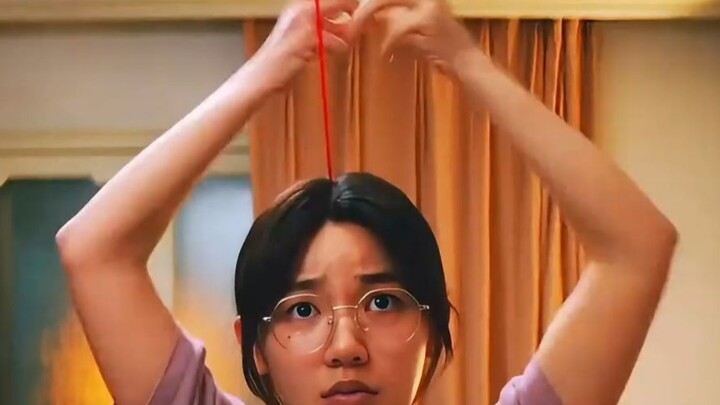 A girl discovered something eerie—suddenly, a red thread appeared on her head, yet no matter how har