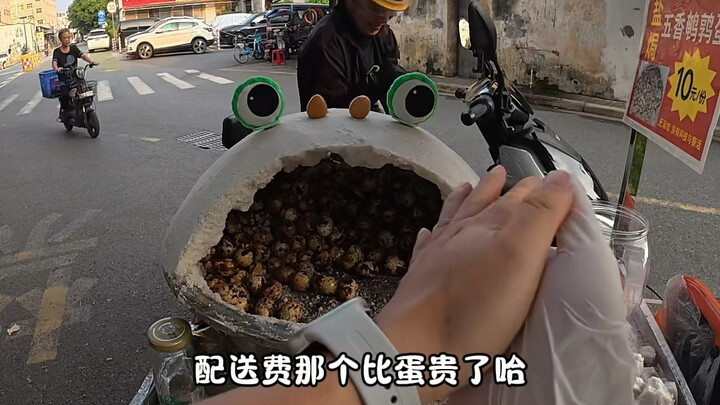 يوم من عام 1998 قضيته في بيع بيض السمان المملح على بسطة في فوشان