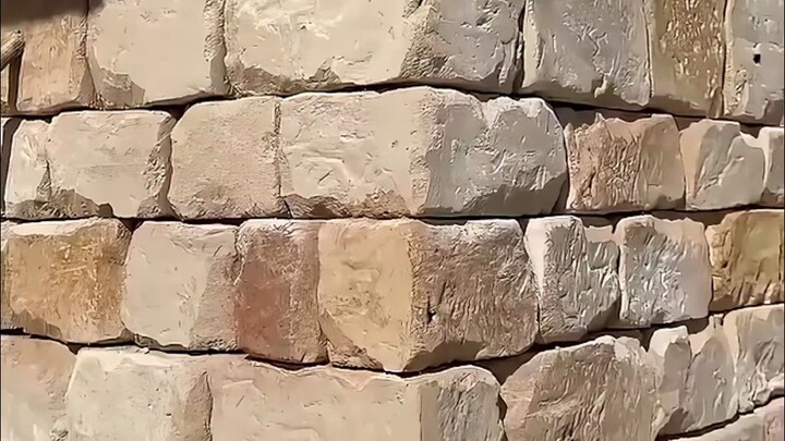 What looks like a neatly stacked stone wall might not be real—most of it is actually made of cement.