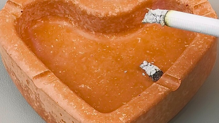 ทำมดแดงไฟเป็นที่เขี่ยบุหรี่