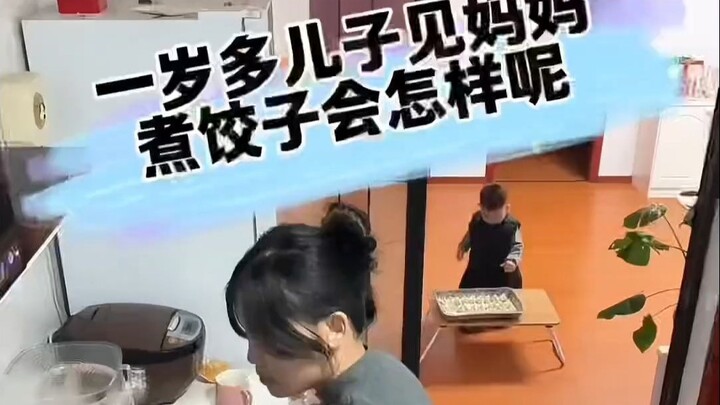 A little over one year old, the baby watches mom bustling about while making dumplings. Helping mom 