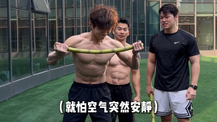 Can a bunch of muscle guys successfully snap sugarcane?