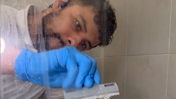 Professionals tackle limescale and grime in the bathroom, armed with a fully stocked toolkit—wonder 