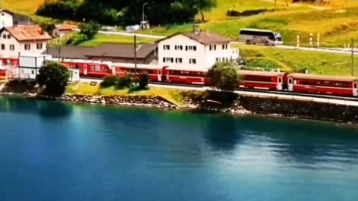 Journey Through the Swiss Alps on the Iconic Red Trains