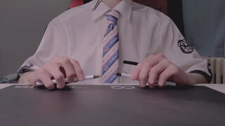 A boy used two pens to play "The Wind Rises"