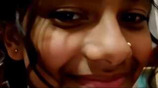 a tikka maang on forehead