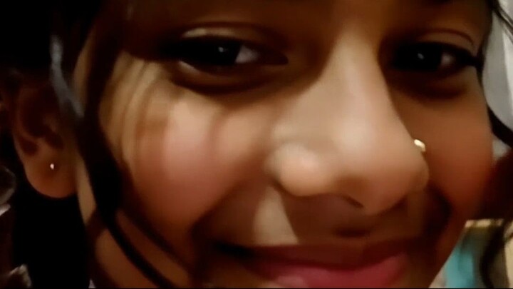 a tikka maang on forehead