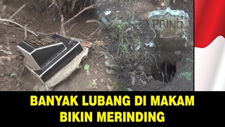 Suasana kuburan di musim hujan sangat mengerikan - banyak lubang dan pohon tumbang