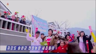 Mudanças para novas moradias na Fazenda Jonchang do condado de Songwon