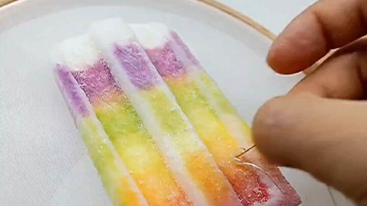 “Hyper-realistic food embroidery”