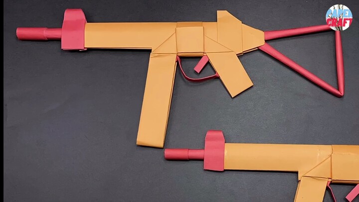 Learn how to make a paper UMP gun with this easy step-by-step origami paper gun