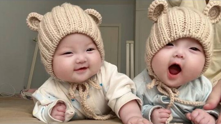 Why are human babies so much fun? They’re practically real-life New Year’s dolls!