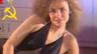 Seorang wanita Soviet dengan stoking sutra hitam memanggil Anda untuk bangun dan berolahraga | Rekam