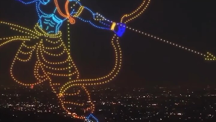 Pertunjukan drone membentuk berbagai adegan memukau seperti formasi lima bintang dan delapan trigram