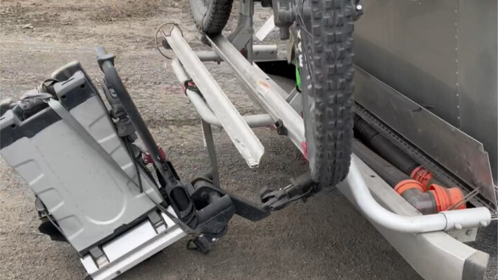 The RV’s bike rack actually came off—today’s damage is pretty severe.
