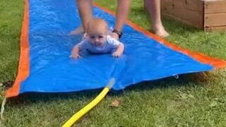 Baby_on_a_slip_n_slide