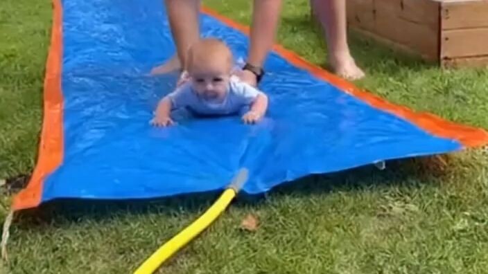 Baby_on_a_slip_n_slide