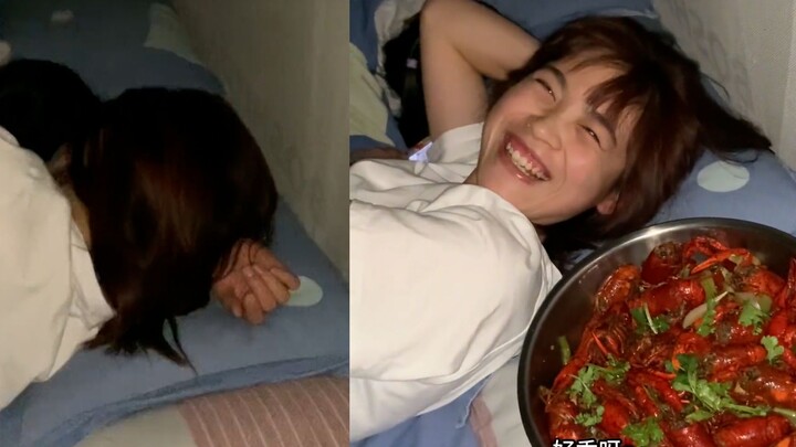 The husband secretly exchanges a secret signal with his wife after the baby falls asleep; their eyes