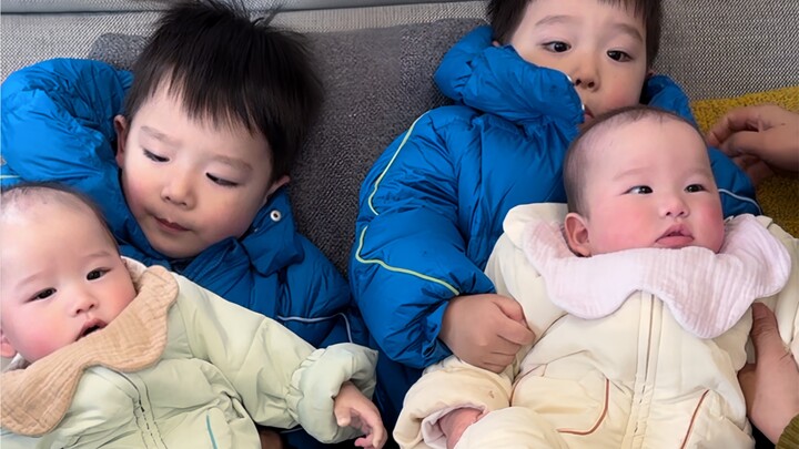 Twin older brother and fraternal twin younger siblings