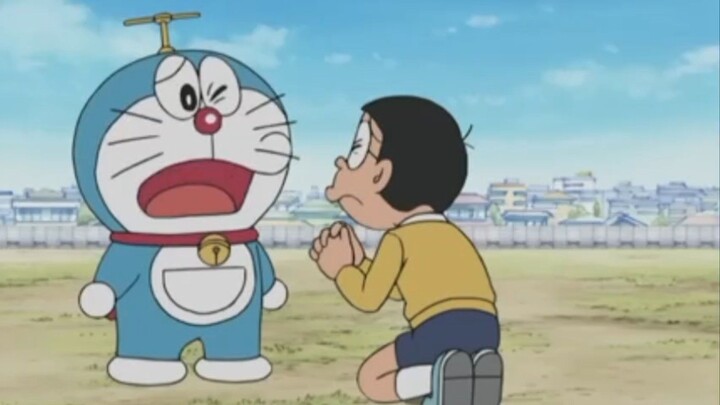 nobita memohon kepada doraemon