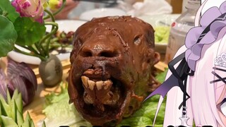 Japanese vampire eats a big sheep head for fun