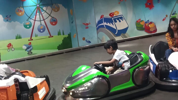 My son playing in car zone