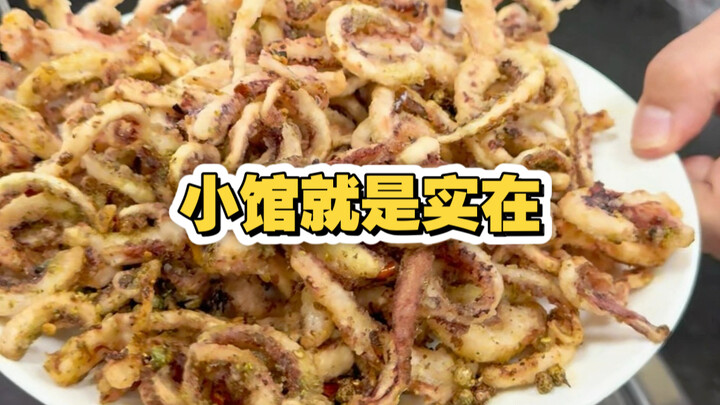 Without any fancy toppings, a plate piled high with squid tentacles—now that’s the real deal at this