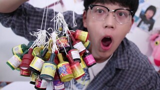 小伙为了提前庆祝100w粉丝，买了一百个礼炮绑在一起庆祝