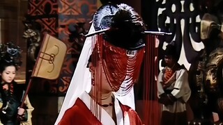 It only makes sense for her to lift the veil and reveal her face, stunning everyone...