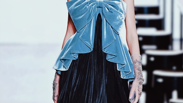 A striking touch of blue—this brand really knows how to nail gown color combinations!