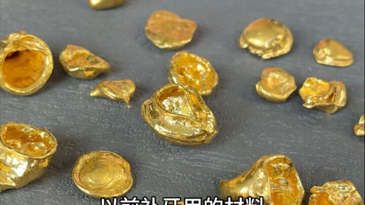 嘴里镶的大金牙是真的吗