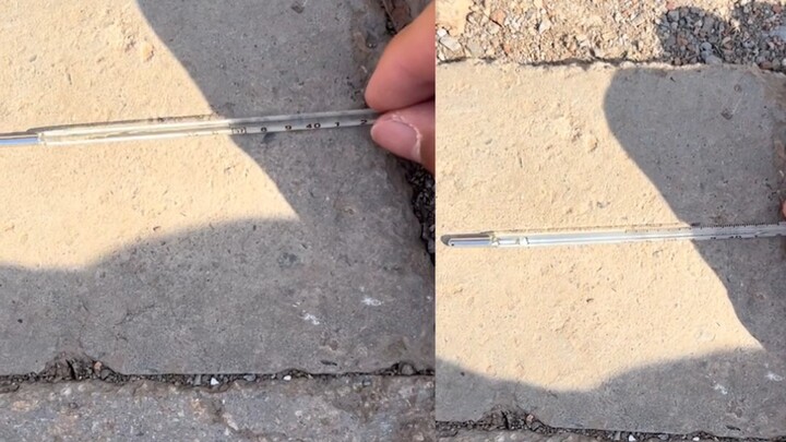 A man in Zhengzhou took a thermometer to measure how hot the weather was, and put it on the ground. 