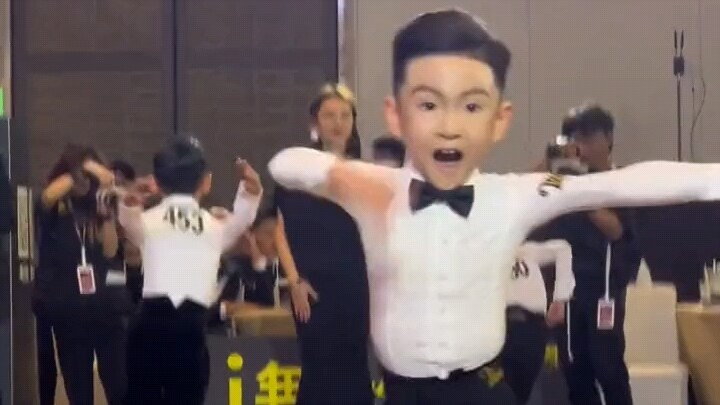 This is so weird! Shouldn't you smile when dancing? Why are you making those weird faces?