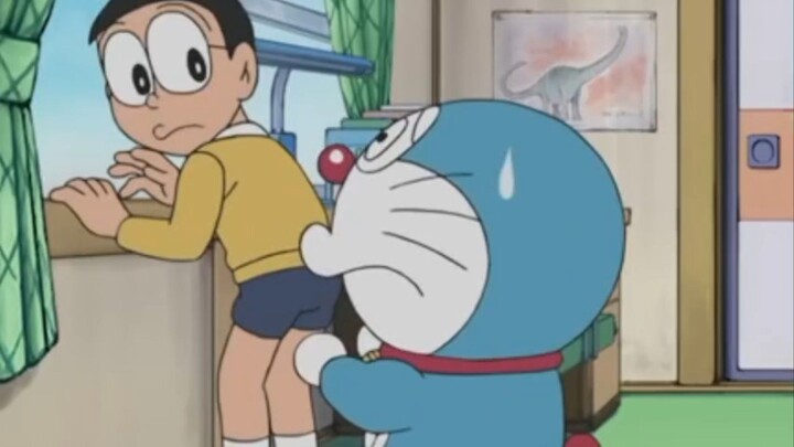 doraemon berusaha membujuk nobita