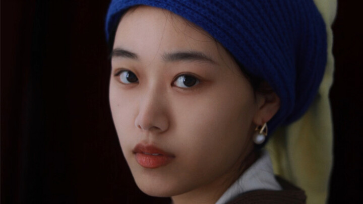 Để chụp bức tranh nổi tiếng này, lần đầu tiên tôi đeo khuyên tai.