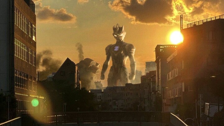 The divine giant radiates light in the setting sun