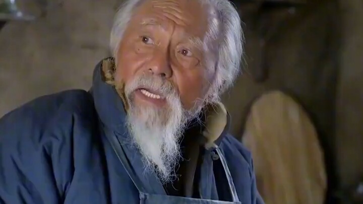 The son was being so stingy about cutting the meat that the old dad just kicked him—only to kick out