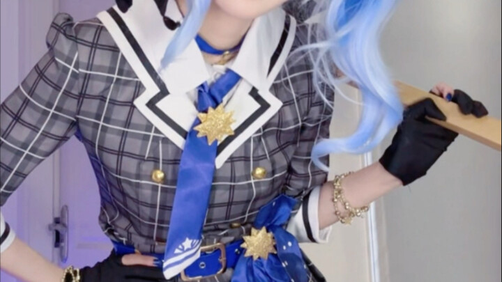 Who's the woman holding the axe?