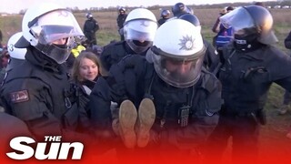 Greta Thunberg arrested by riot police at heated German coal mine protest