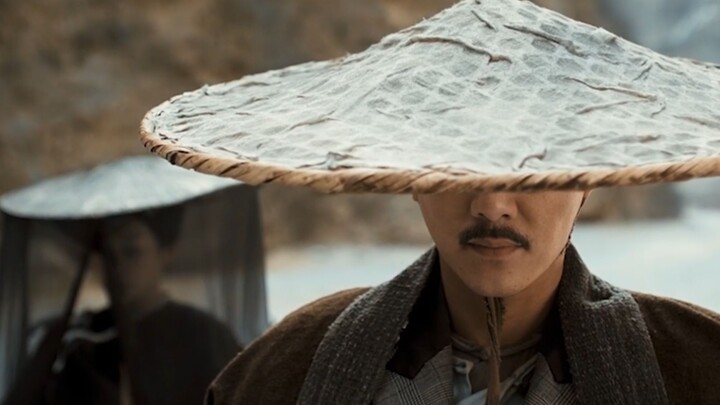 The mysterious figure finally lifts the veil—turns out, beneath that conical hat lies none other tha