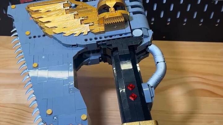 Loyalty! Everyone can have a chainsaw axe! It's just a Lego version, the chainsaw can be rotated and