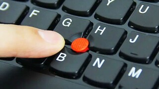 I'm curious! What is the red dot on the laptop keyboard used for?