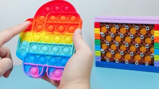 ท่ามกลาง US Rainbow POP-IT สูตรตกแต่งเค้กสายรุ้งจาก LEGO - Stop Motion Cooking & Lego ASMR