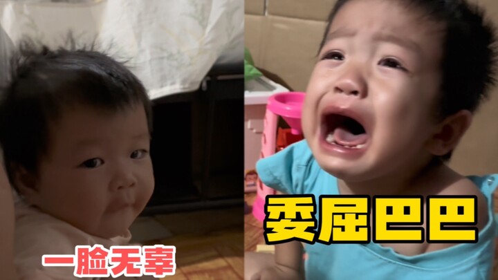 Two-year-old older brother hits his 7-month-old sister, then bursts into tears himself.