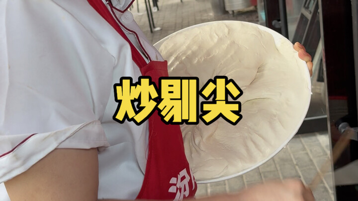 Hand-pulled noodle stir-fry: It takes 70–80 strikes to make a single bowl, resulting in chewy, delic