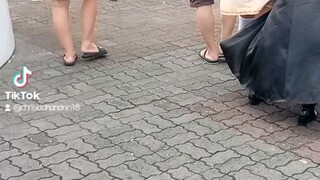 I See annya Walking to street Mall of asia