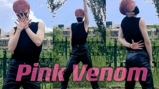 Pink Venom with red hair and leather pants