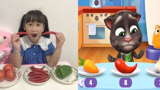 Talking Tom: Adik perempuan kehidupan nyata meniru Tom dan makan paprika dan tomat