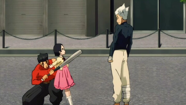 One Punch Man: He swung the metal bat and hit Garou, but was stopped by his sister in time.